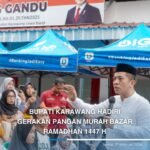 Bupati Karawang Hadiri Gerakan Pangan Murah Bazar Ramadhan 1447 H di Jatisari 70f13d0e9bd1f5fdcf8a00d026af1708_0